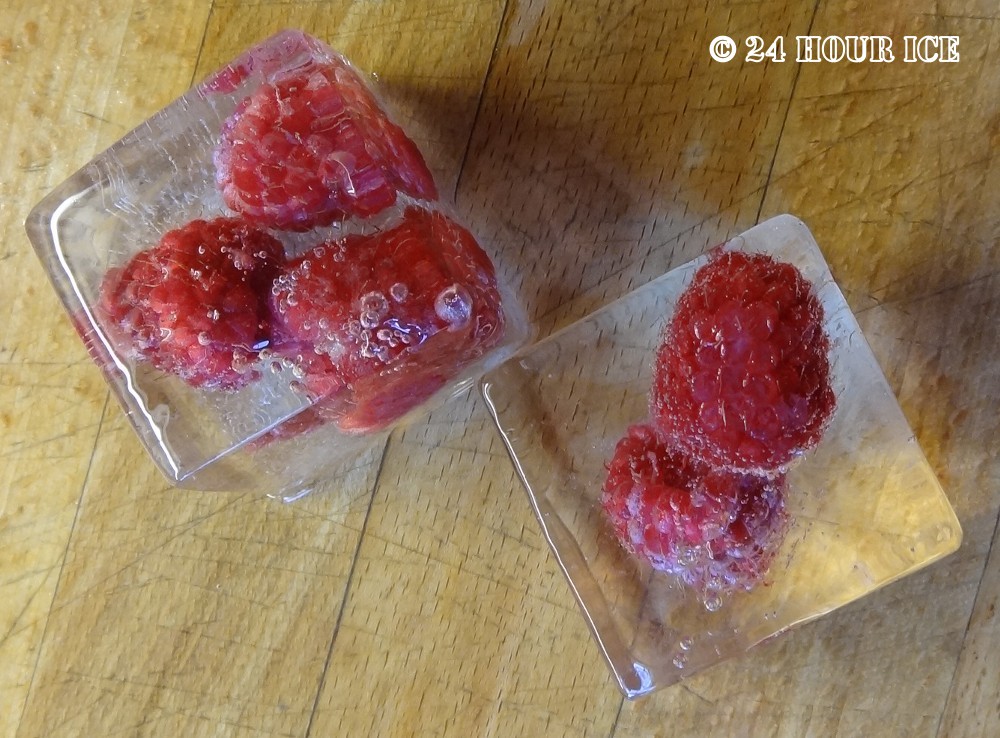 Frozen soft fruit in ice cubes.